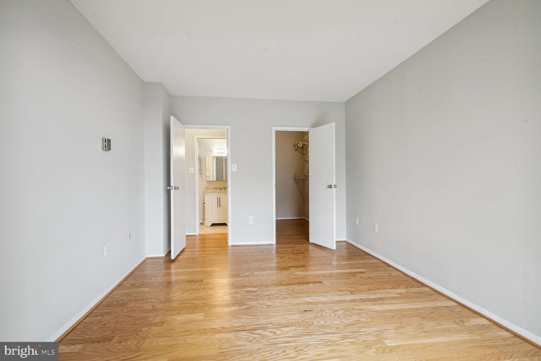 4141 North Henderson Road, Unit 825 Arlington, VA 22203 - Photo 16 of 29 Bedroom view with Walk-in Closet