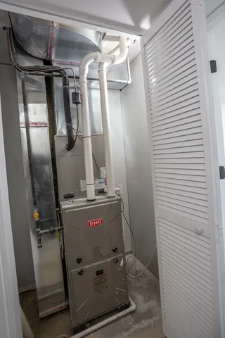 a view of a refrigerator in kitchen