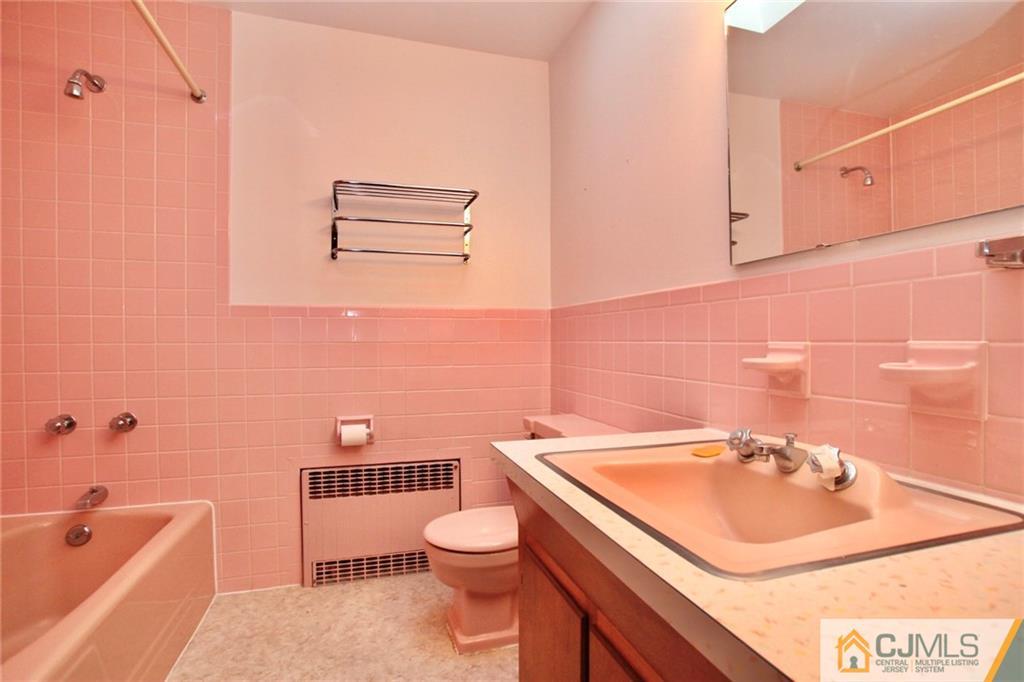 959 Ridge Road Princeton, NJ 08540 - Photo 19 of 25 a bathroom with a sink a toilet and shower