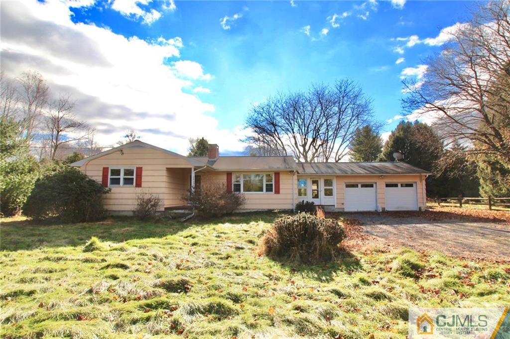 959 Ridge Road Princeton, NJ 08540 - Photo 23 of 25 a view of a house with a yard covered with snow