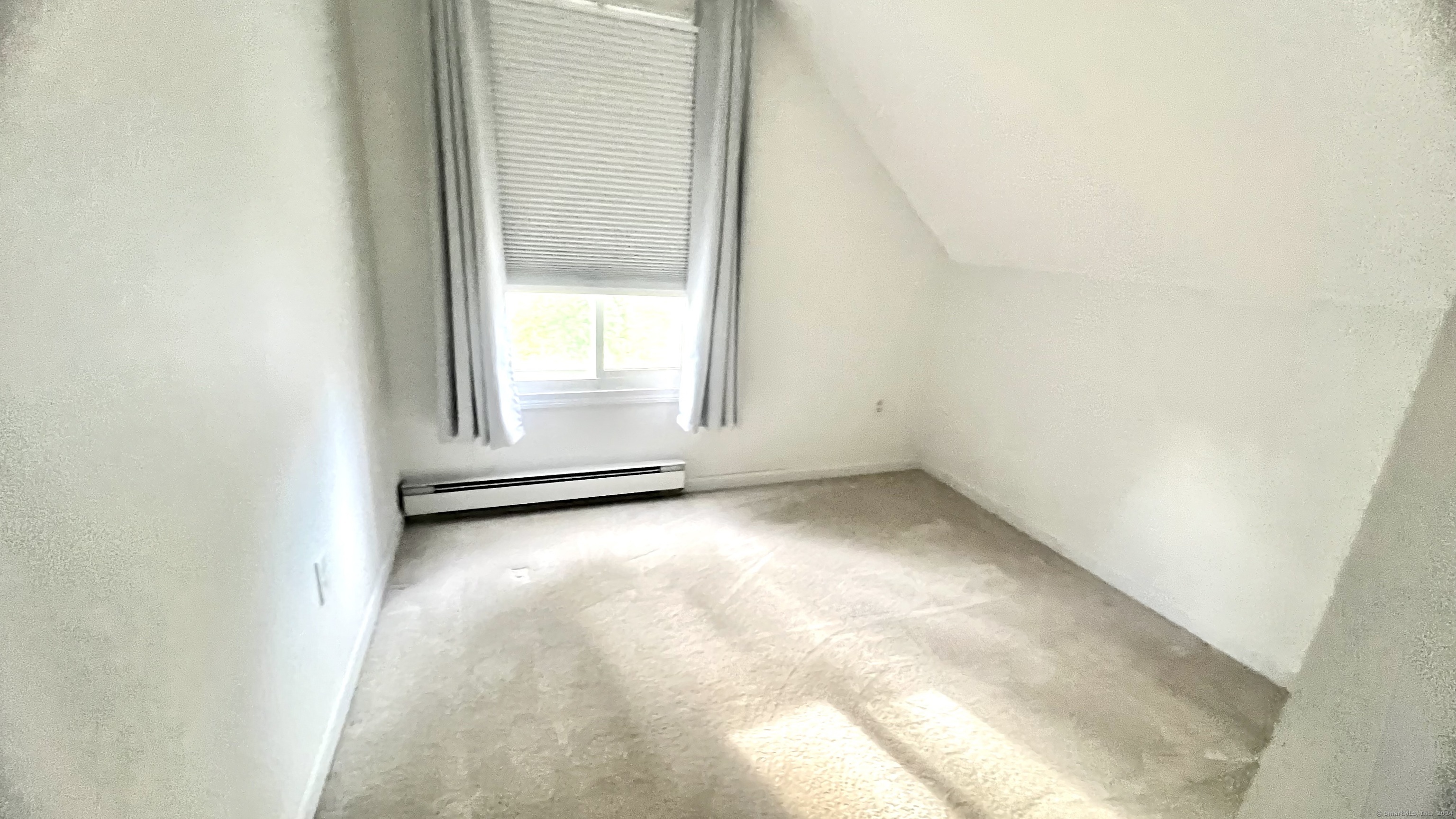 1 Cinnamon Spring, Unit 1 South Windsor, CT 06074 - Photo 11 of 16 an empty room with an empty space and window