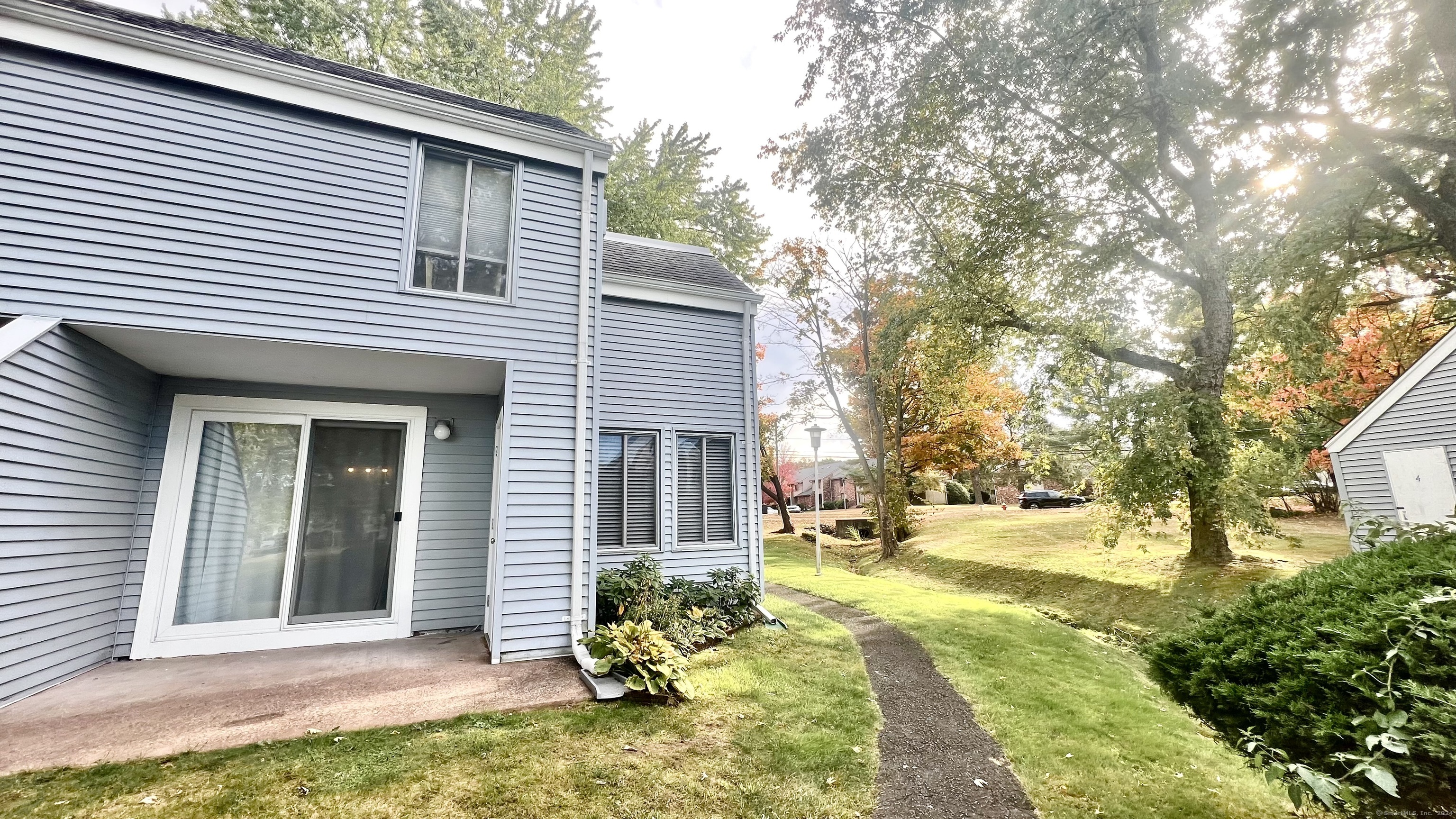 1 Cinnamon Spring, Unit 1 South Windsor, CT 06074 - Photo 15 of 16 a view of backyard of the house