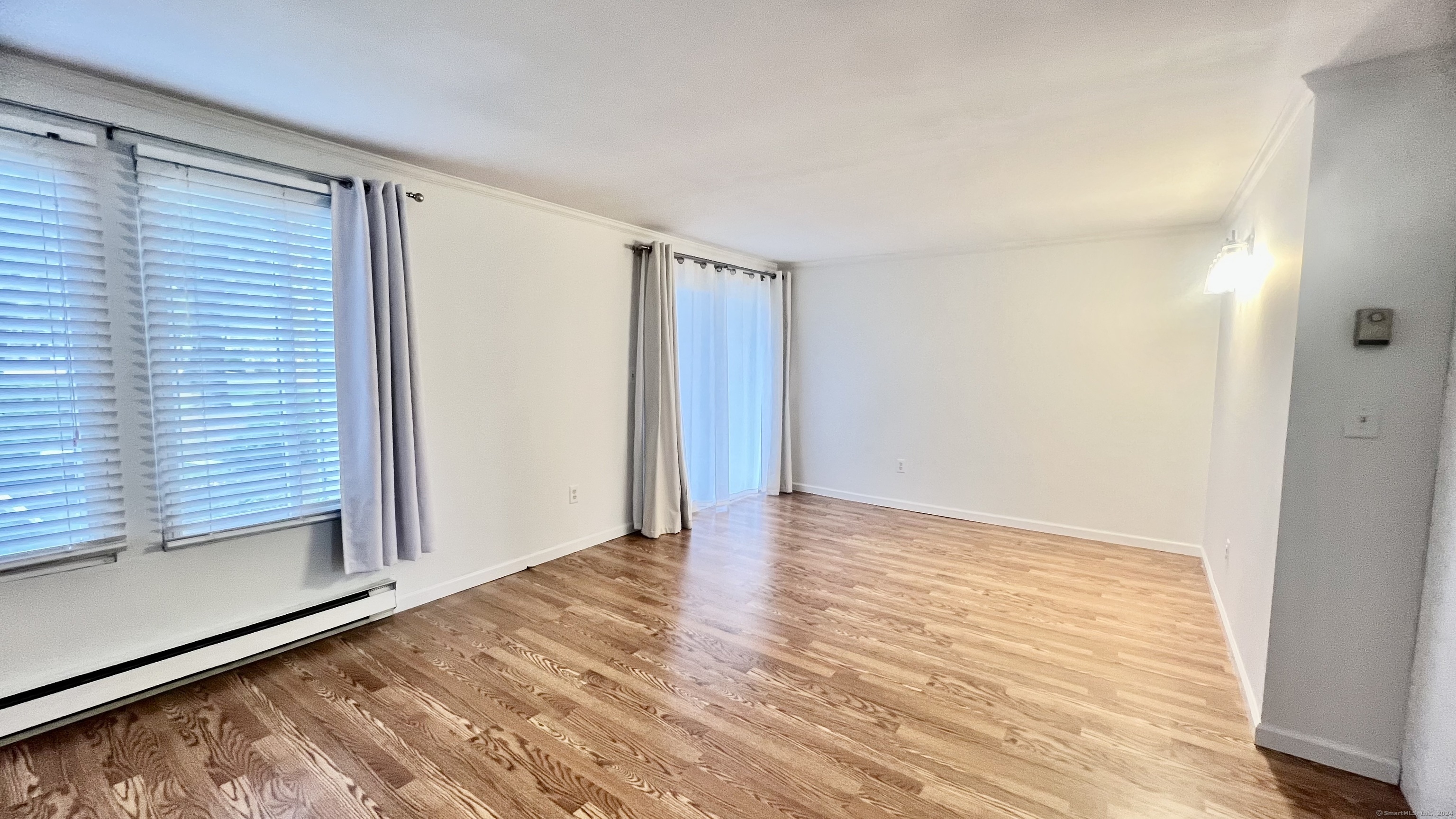 1 Cinnamon Spring, Unit 1 South Windsor, CT 06074 - Photo 3 of 16 a view of an empty room and window