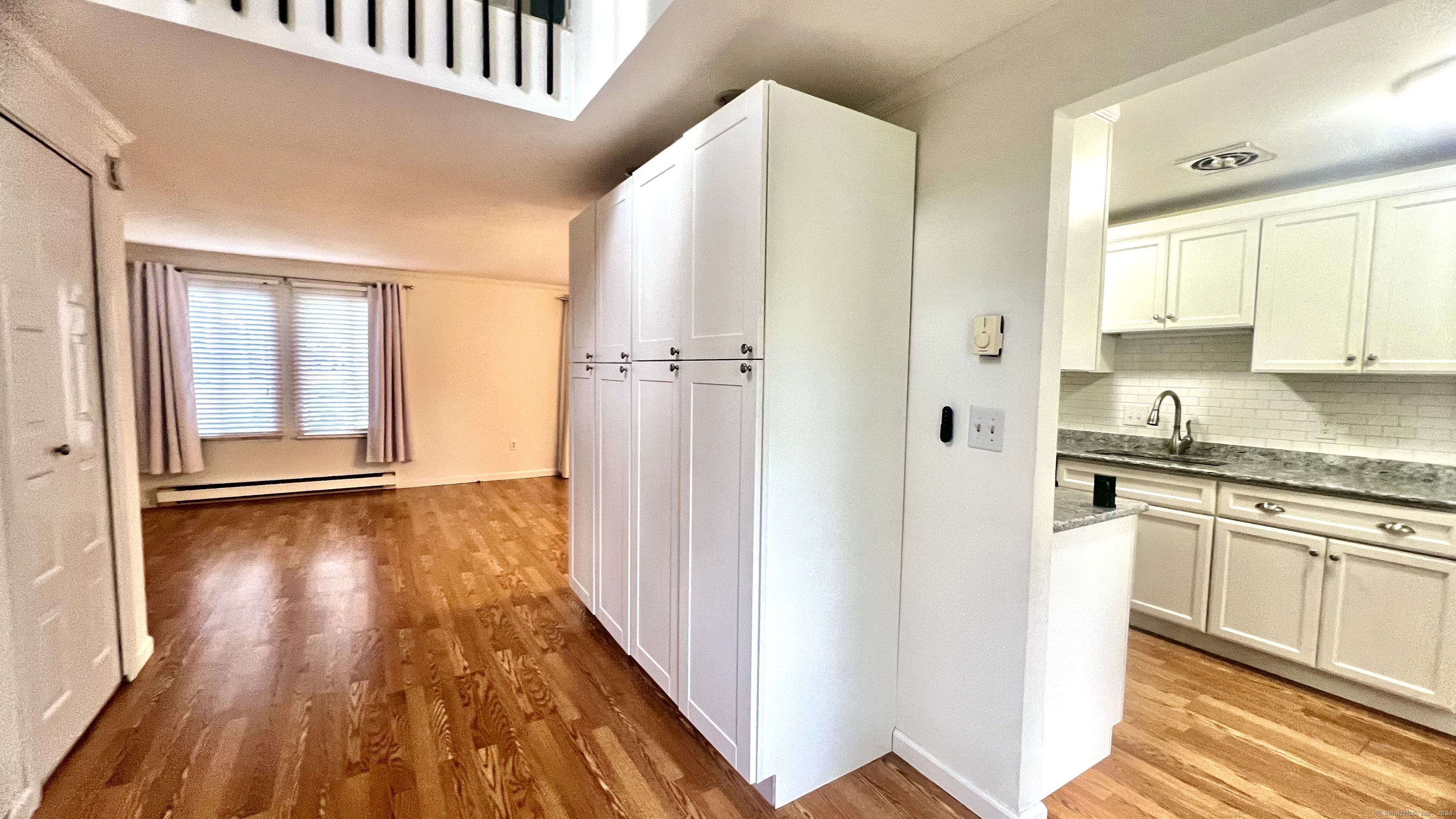 1 Cinnamon Spring, Unit 1 South Windsor, CT 06074 - Photo 5 of 16 a view of a kitchen cabinets and wooden floor