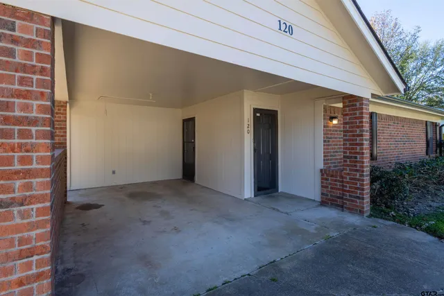 a view of an empty room with a garage