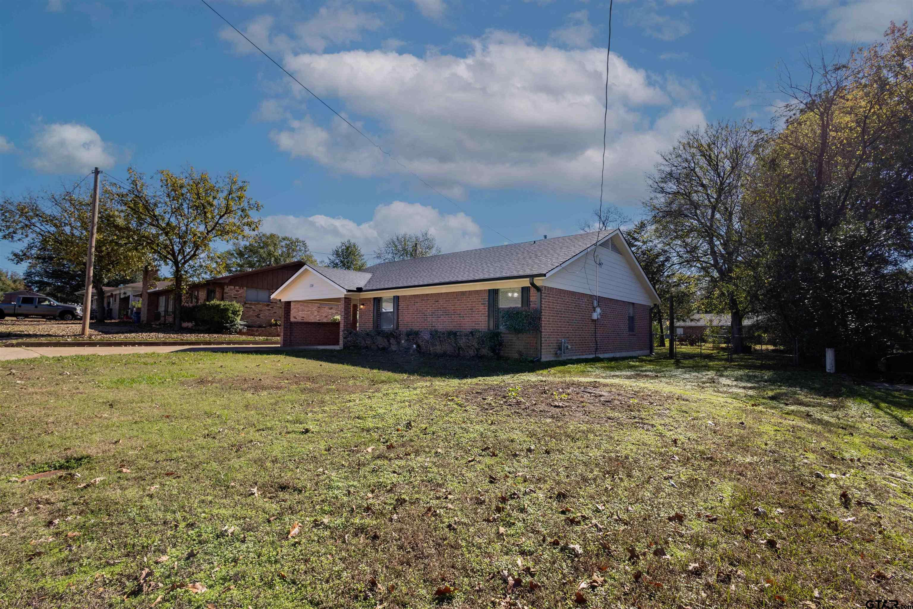 120 Laura Street Mineola, TX 75773 - Photo 8 of 27 a house view with swimming pool in front of it