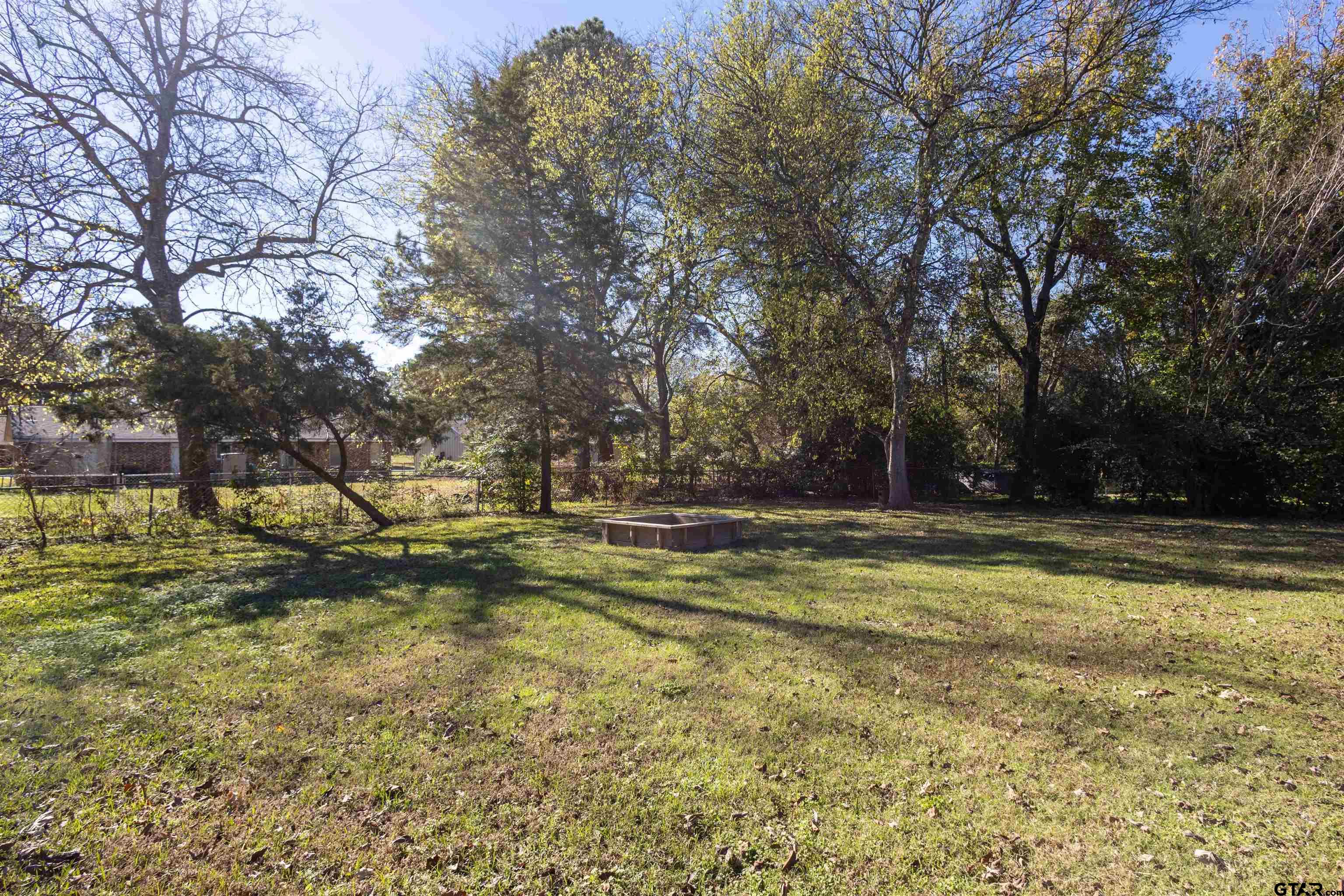 120 Laura Street Mineola, TX 75773 - Photo 9 of 27 a view of swimming pool with trees