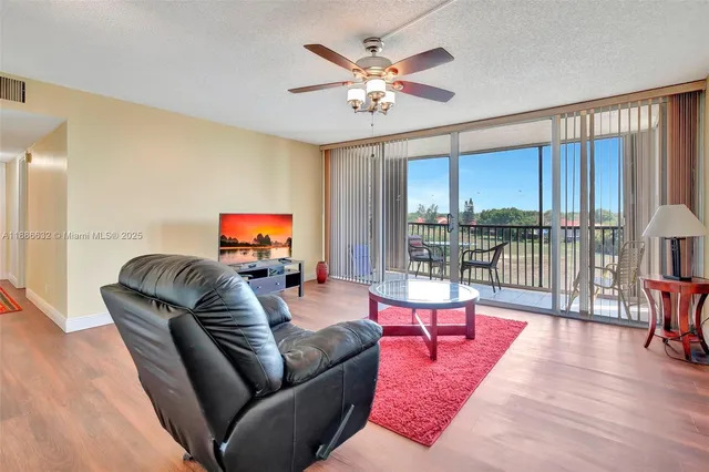 a bedroom with a bed and a lamp on table