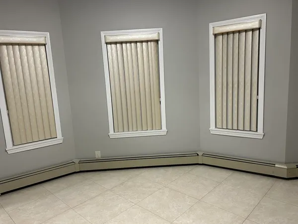 an empty room with windows