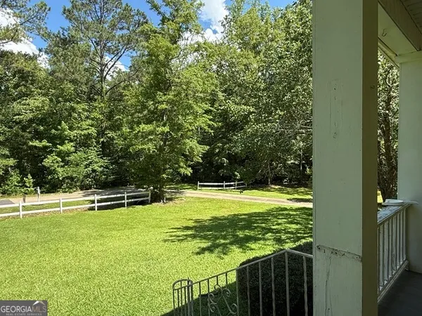 a view of swimming pool from a balcony