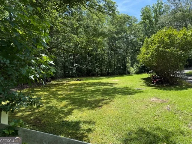 a view of outdoor space with a lake view