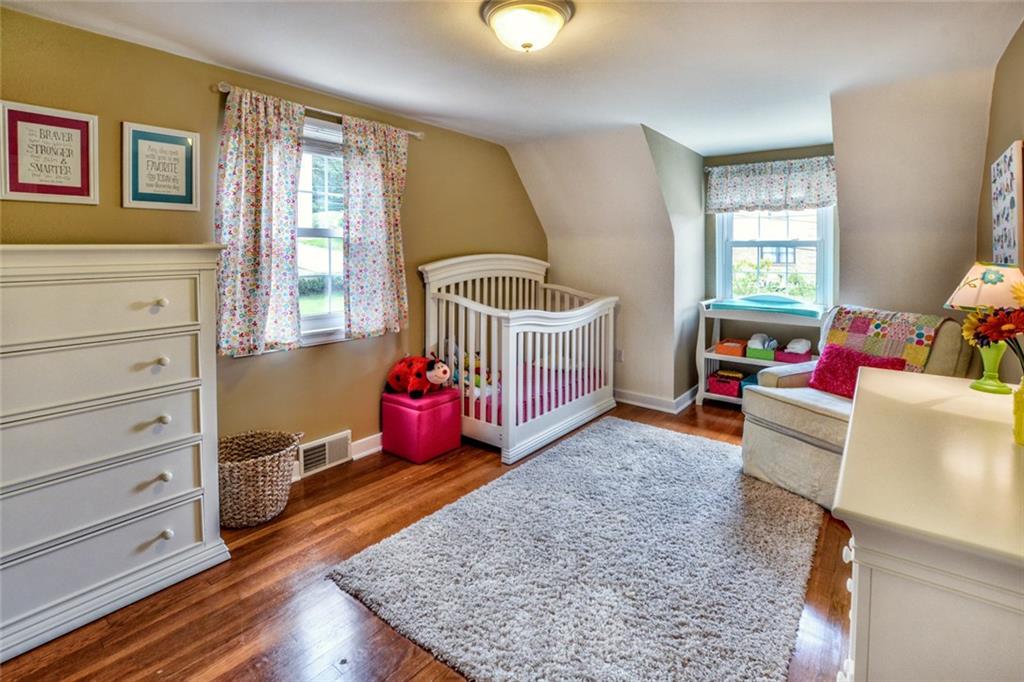 109 Deimling Road Pittsburgh, PA 15229 - Photo 15 of 23 Bedroom 2 - Featuring Hardwood Floors and Lots of Closet Space