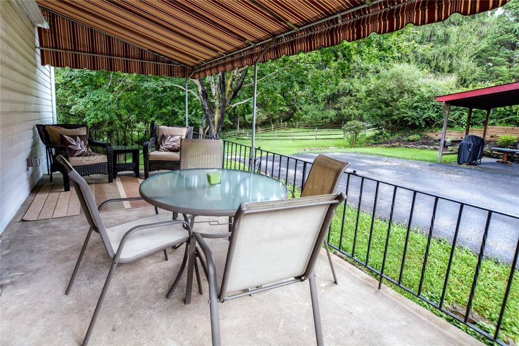 109 Deimling Road Pittsburgh, PA 15229 - Photo 20 of 23 Porch/Patio - The Living Space is Expanded to the Outdoors with this Awning Covered Porch