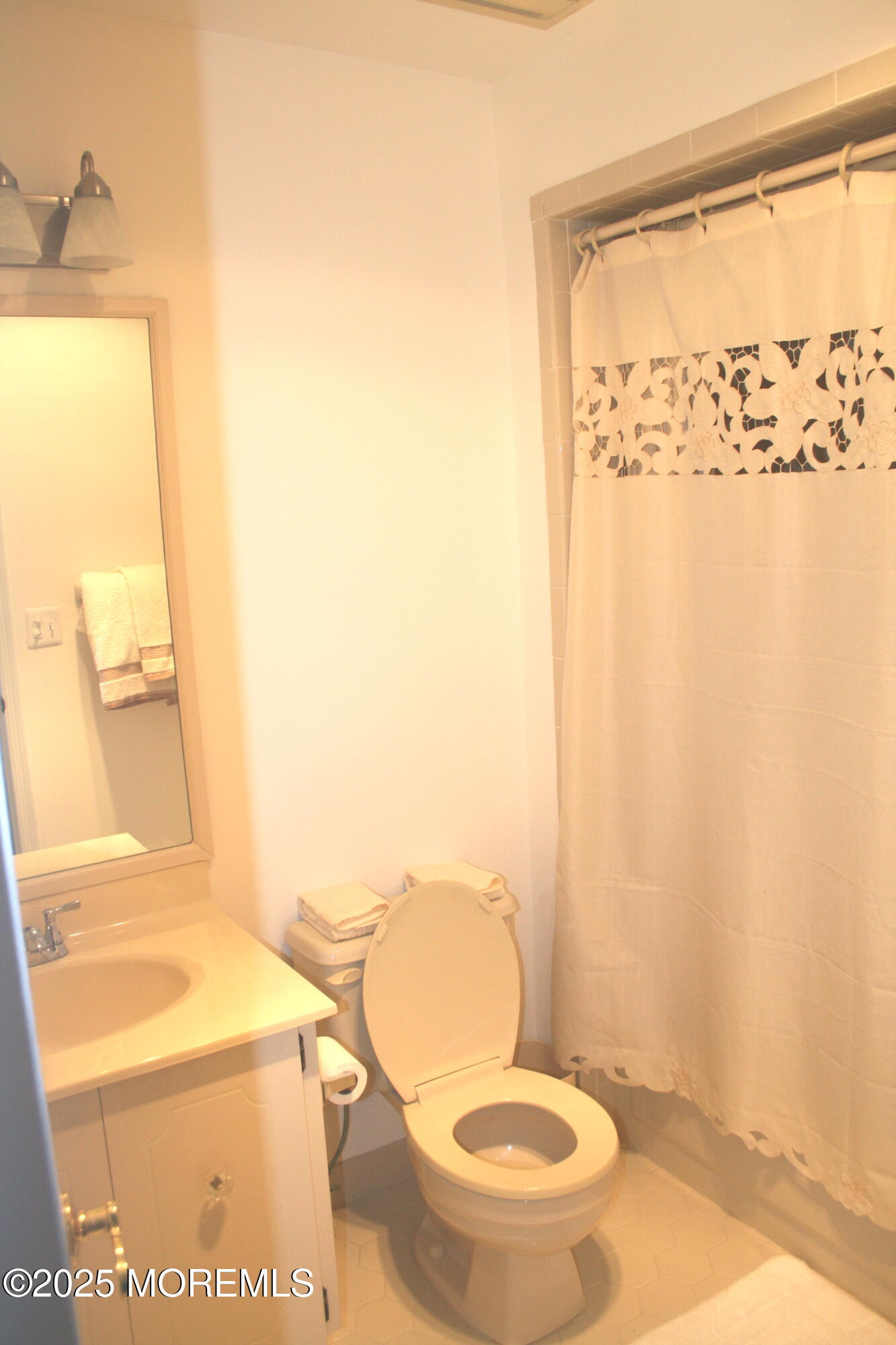 35 Apple Drive Spring Lake Heights, NJ 07762 - Photo 17 of 23 a bathroom with a toilet and a sink