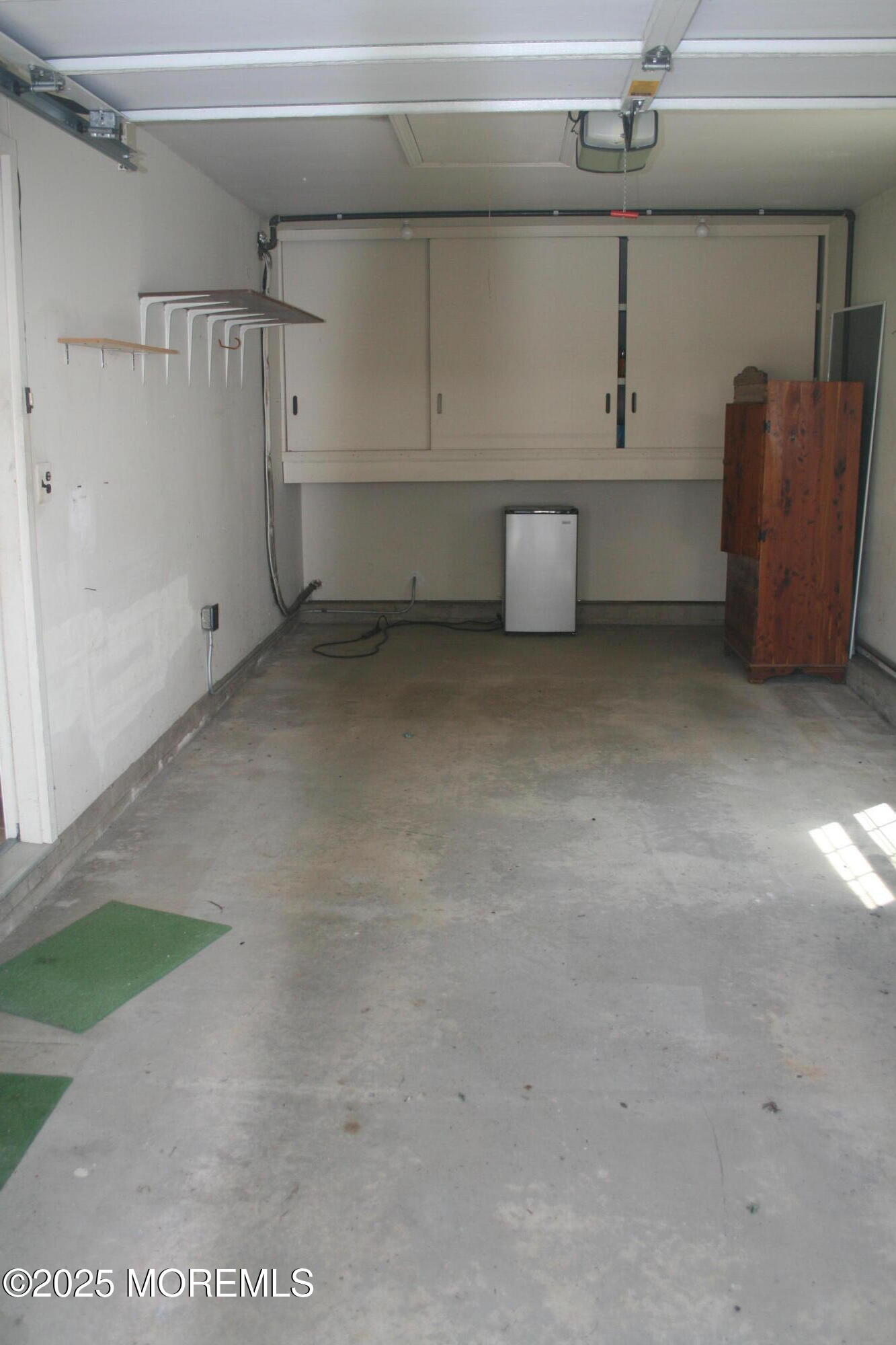 35 Apple Drive Spring Lake Heights, NJ 07762 - Photo 23 of 23 a view of storage and utility room with a cabinet