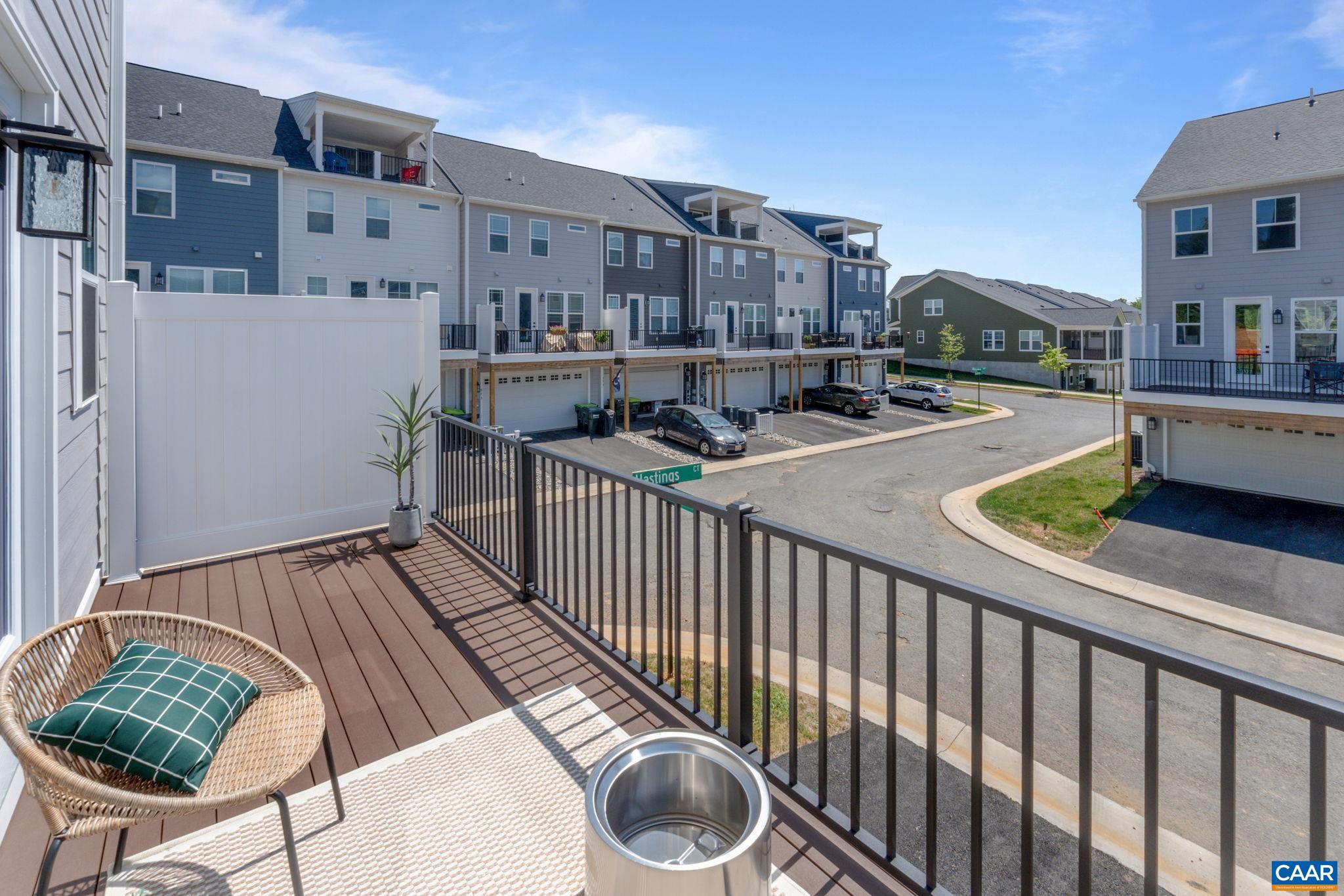 2215 Woodburn Road Charlottesville, VA 22901 - Photo 12 of 32 a balcony with table and chairs