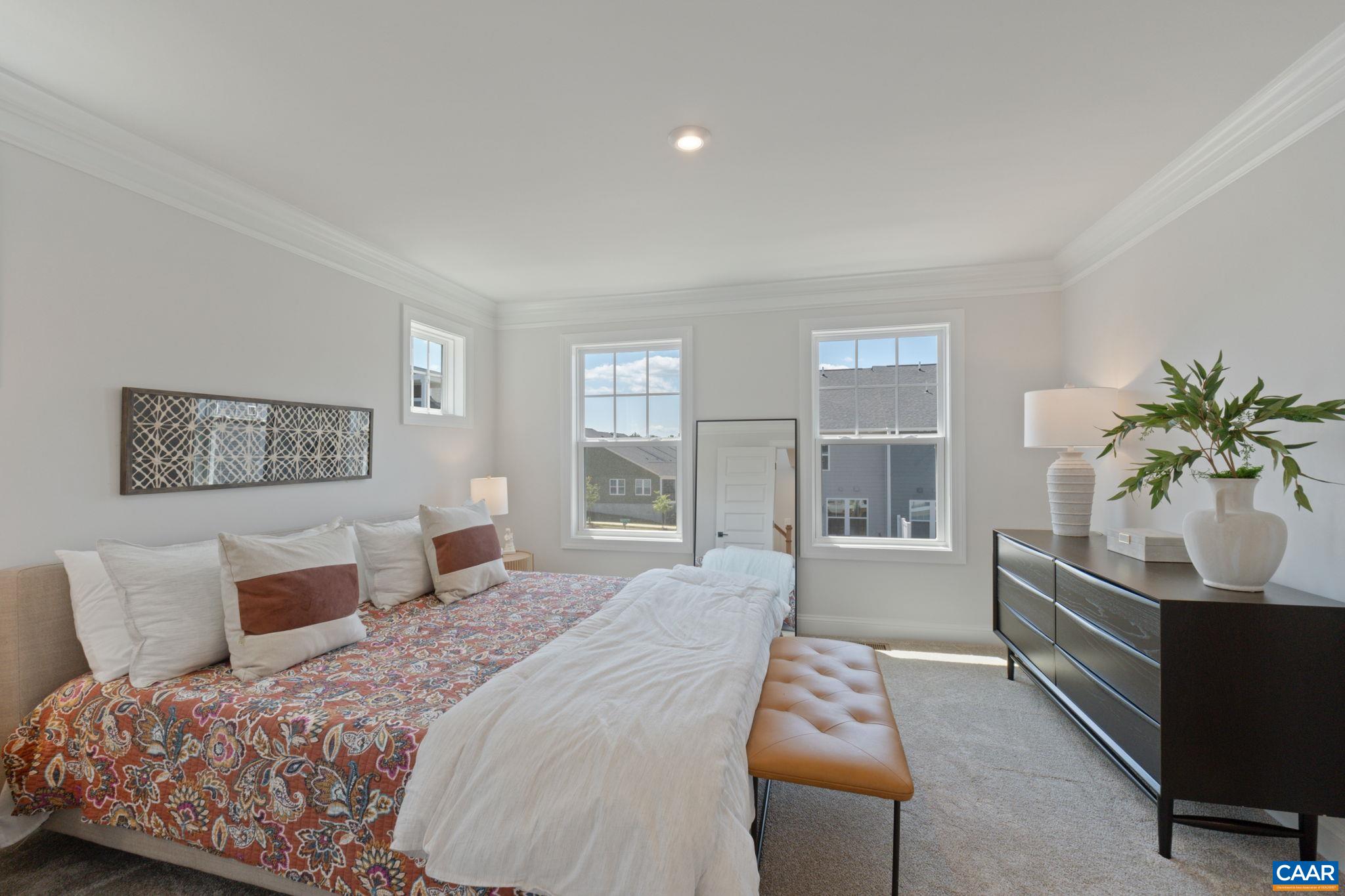 2215 Woodburn Road Charlottesville, VA 22901 - Photo 16 of 32 a bedroom with a large bed and a window