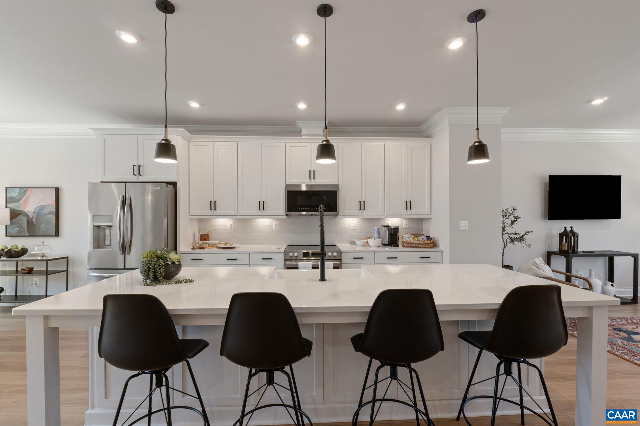 2215 Woodburn Road Charlottesville, VA 22901 - Photo 8 of 32 a kitchen with stainless steel appliances kitchen island granite countertop a sink and cabinets