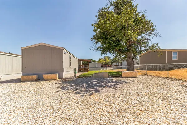 a view of a balcony with wooden floor