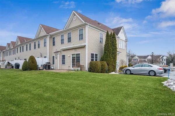 a view of a yard in front of a house