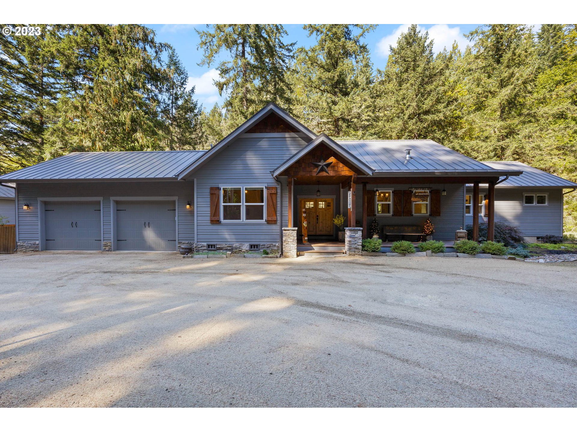 37693 Hills Creek Road Springfield, OR 97478 - Photo 1 of 48 a front view of a house with a garden