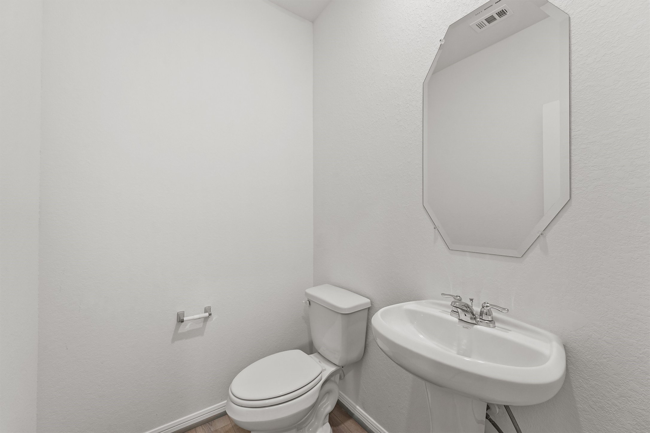 19111 Hazel Firs Court Magnolia, TX 77355 - Photo 20 of 34 a bathroom with a sink a toilet and a mirror