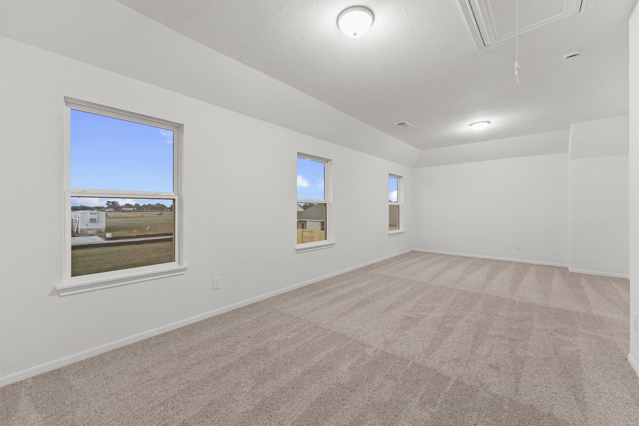 19111 Hazel Firs Court Magnolia, TX 77355 - Photo 23 of 34 a view of empty room with windows