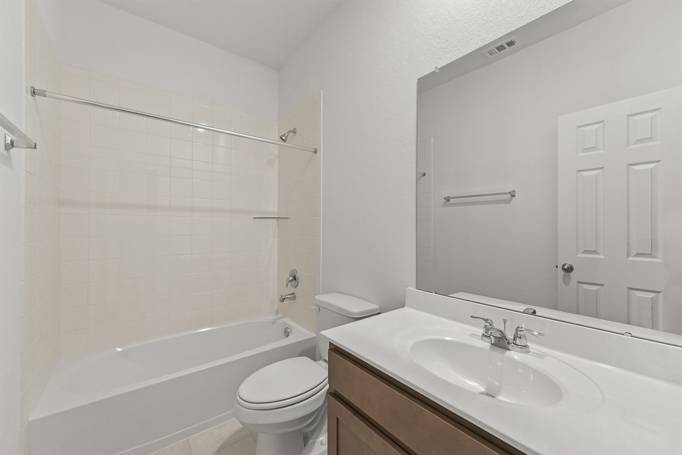19111 Hazel Firs Court Magnolia, TX 77355 - Photo 24 of 34 a bathroom with a sink a toilet and shower