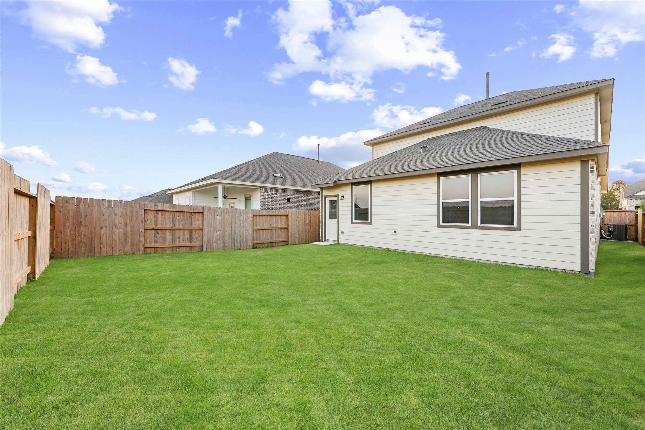 19111 Hazel Firs Court Magnolia, TX 77355 - Photo 31 of 34 a view of a backyard of the house