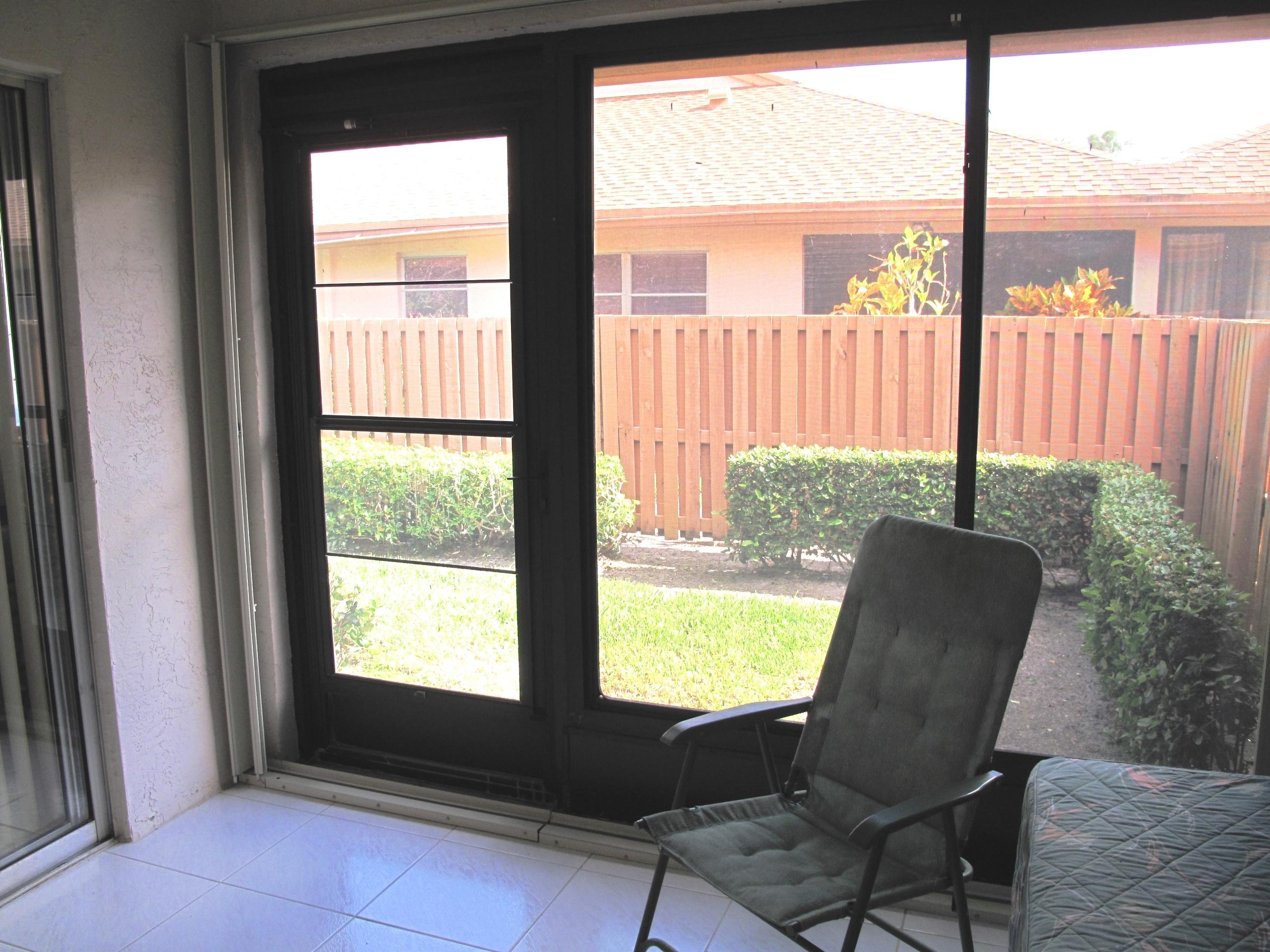 8152 Sweetbriar Way, Unit A Boca Raton, FL 33496 - Photo 16 of 44 Enclosed Florida room (1)