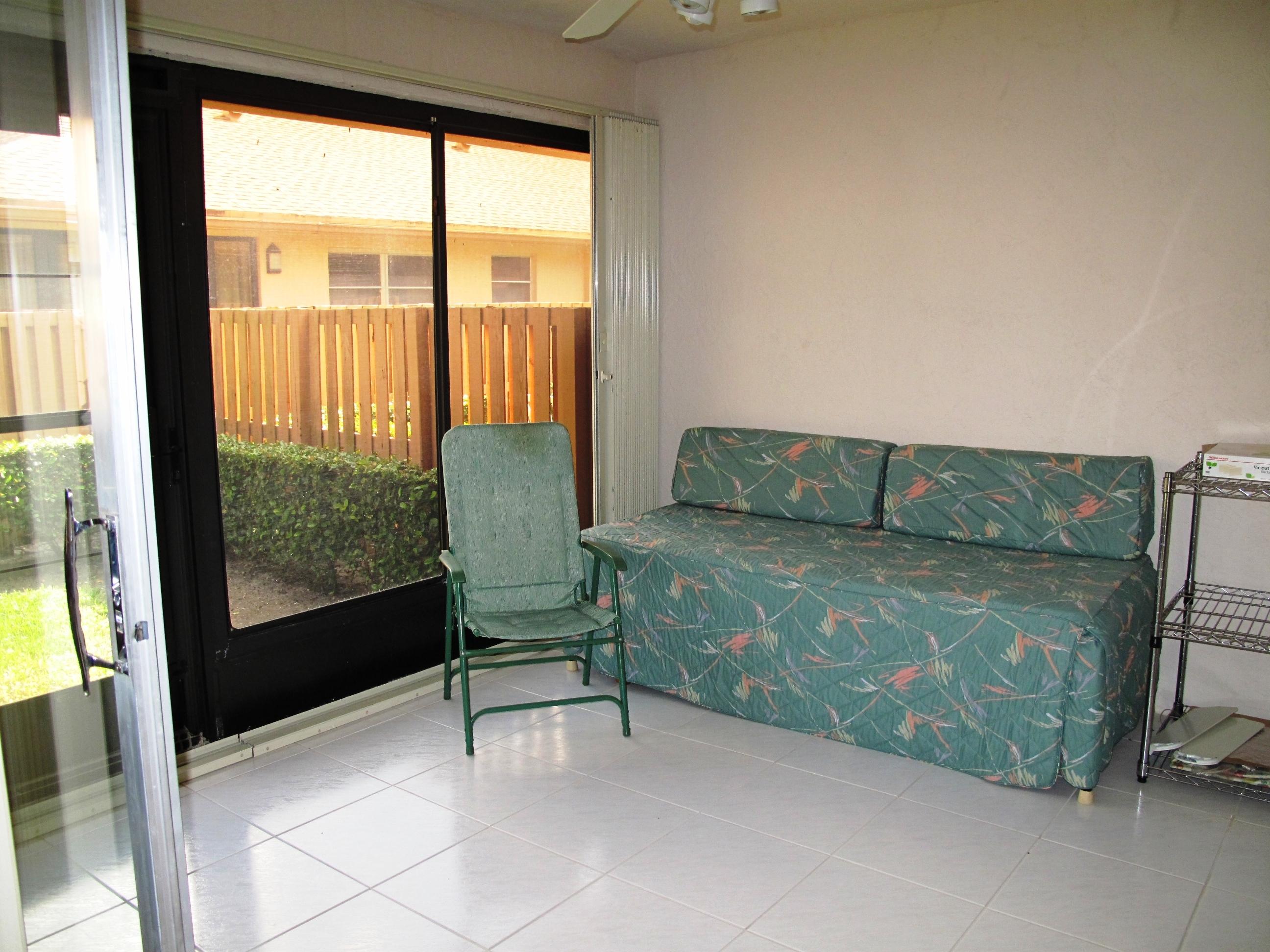 8152 Sweetbriar Way, Unit A Boca Raton, FL 33496 - Photo 17 of 44 Enclosed Florida room (2)