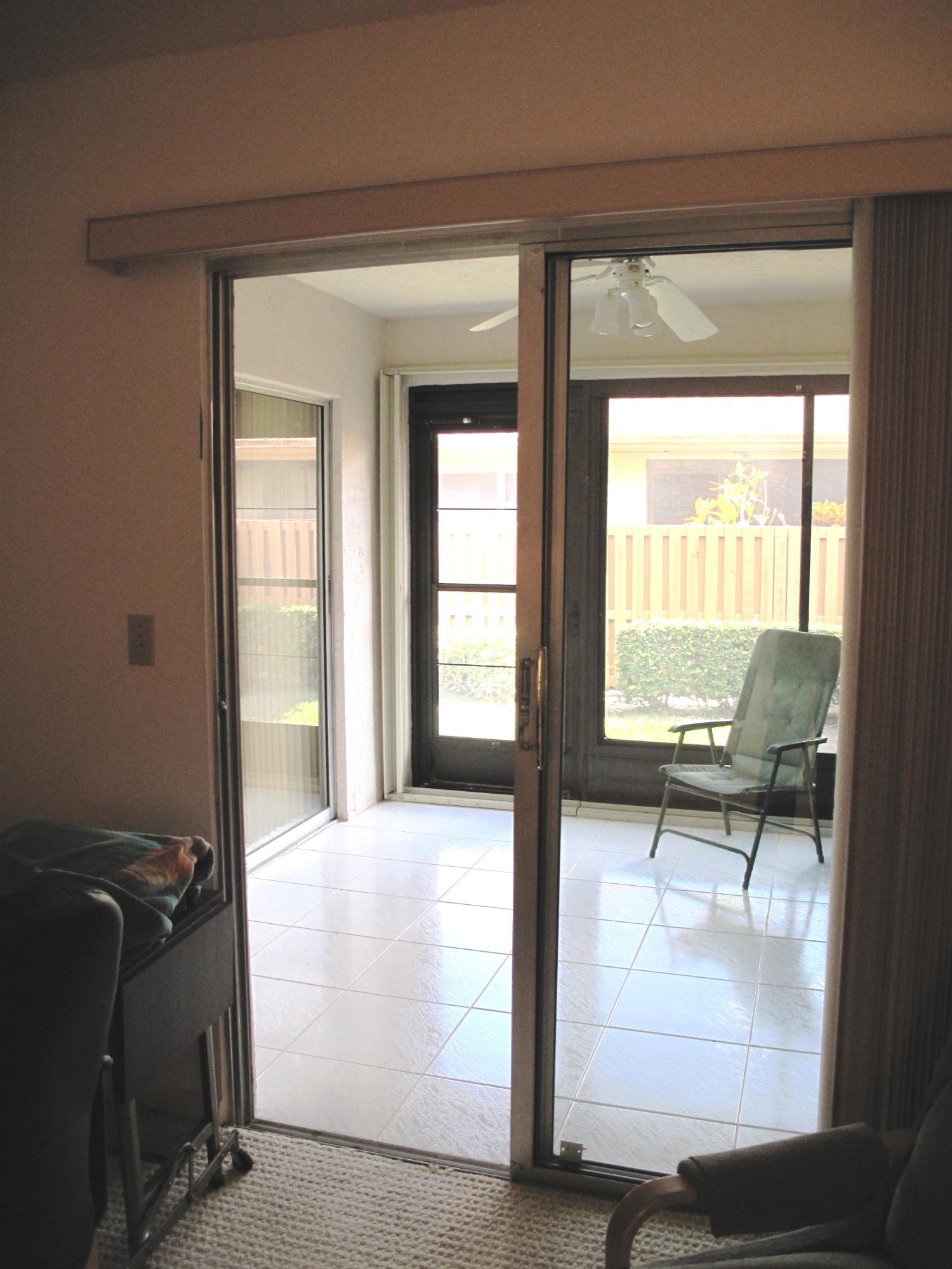 8152 Sweetbriar Way, Unit A Boca Raton, FL 33496 - Photo 18 of 44 View of Florida room from 2nd bedroom