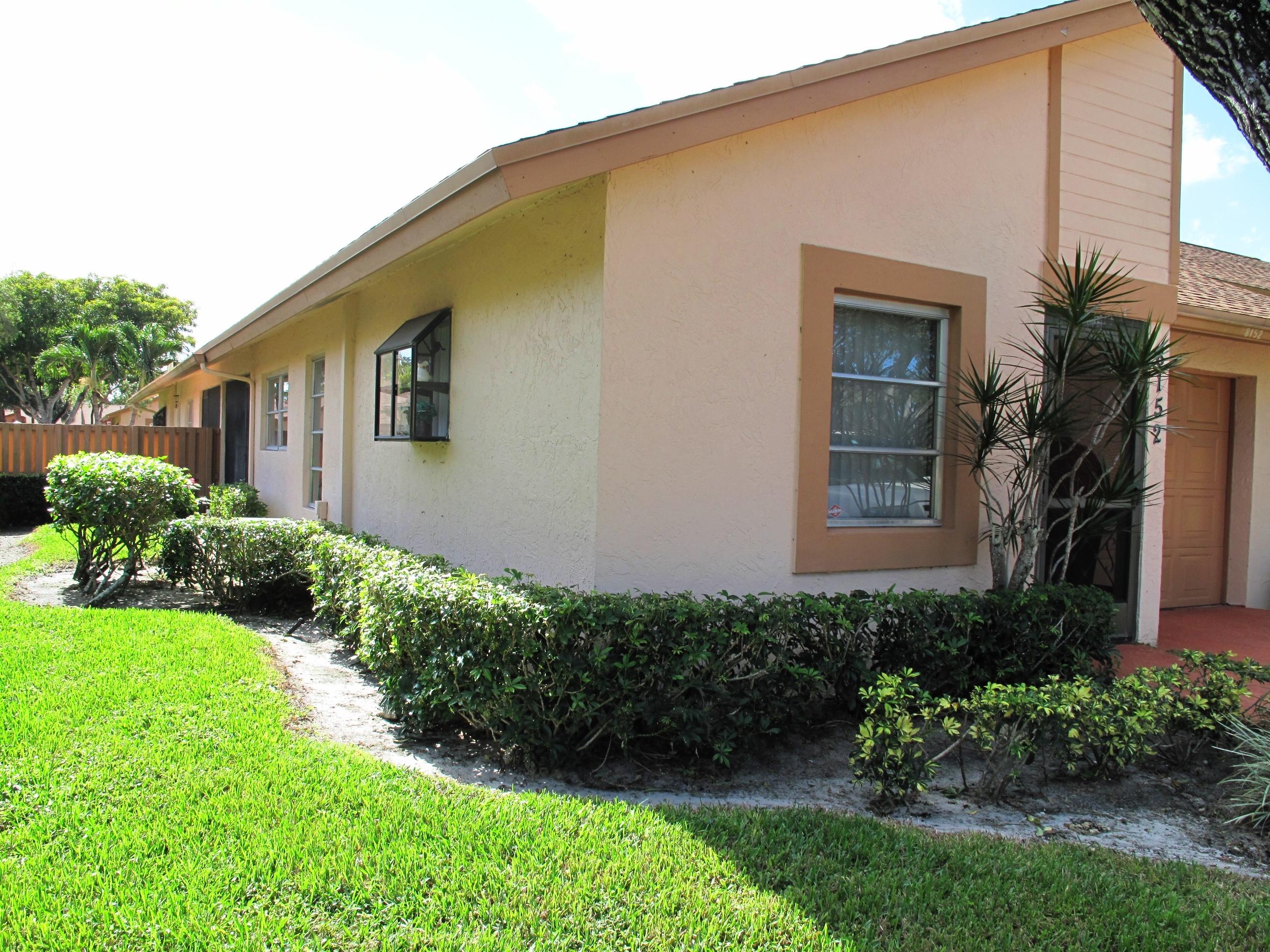8152 Sweetbriar Way, Unit A Boca Raton, FL 33496 - Photo 33 of 44 Side view of villa (1)