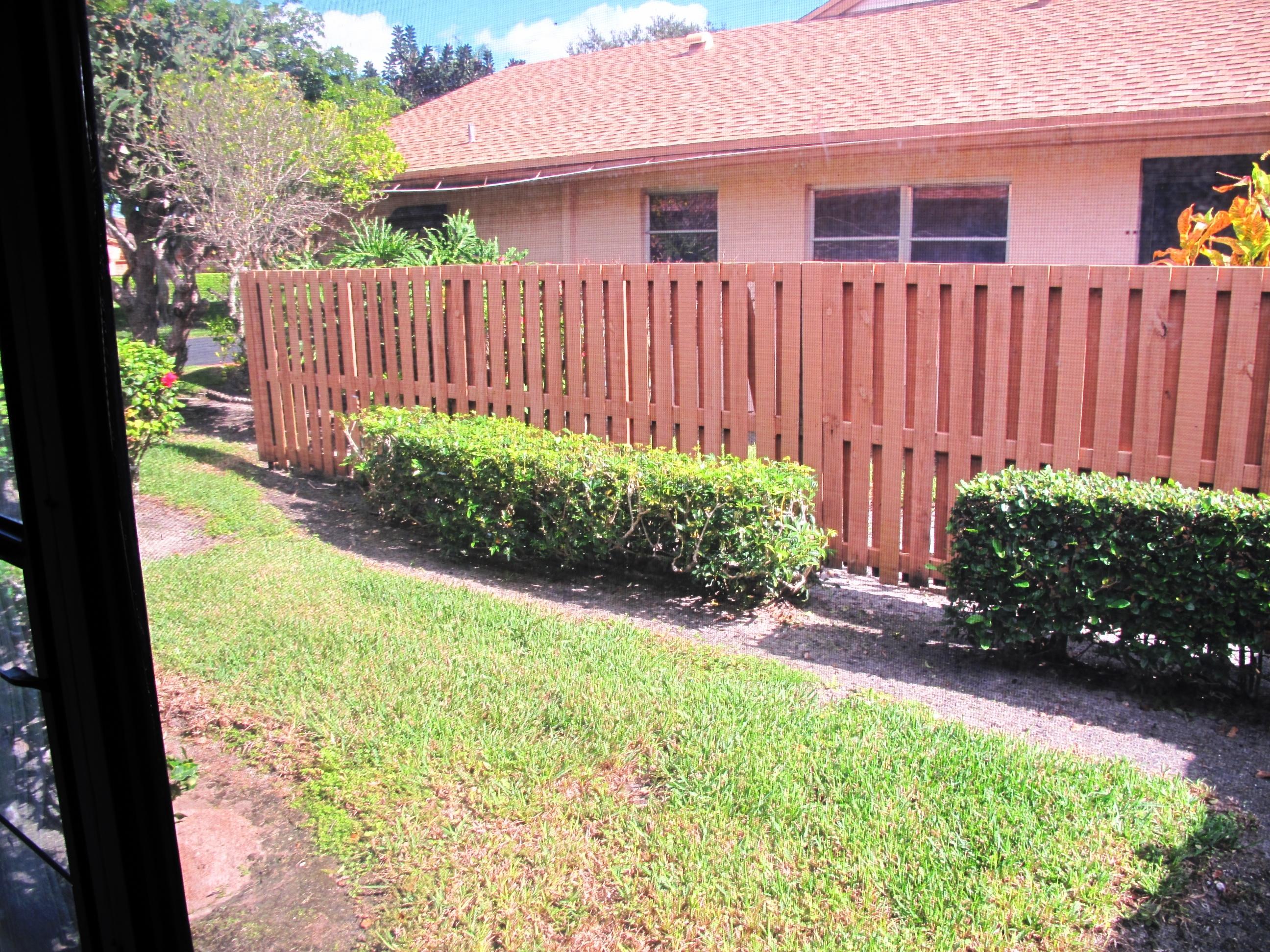 8152 Sweetbriar Way, Unit A Boca Raton, FL 33496 - Photo 35 of 44 View from enclosed Florida room