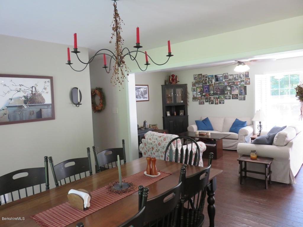 714 Dimmock Road Otis, MA 01253 - Photo 3 of 14 a living room with furniture and wooden floor