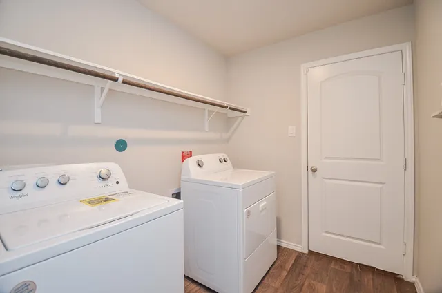 a utility room with dryer and washer