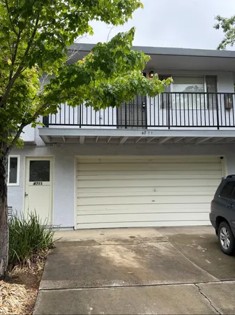 a view of a house with a patio