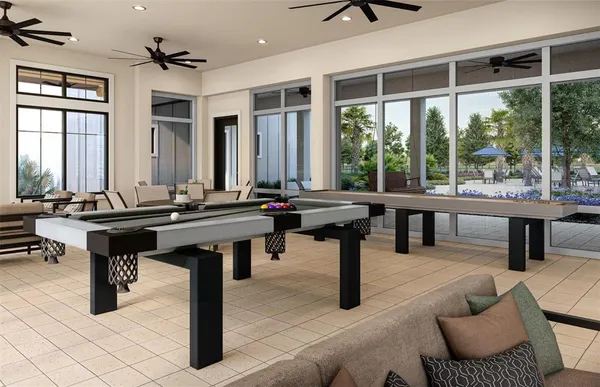 a view of a house with pool yard and outdoor seating