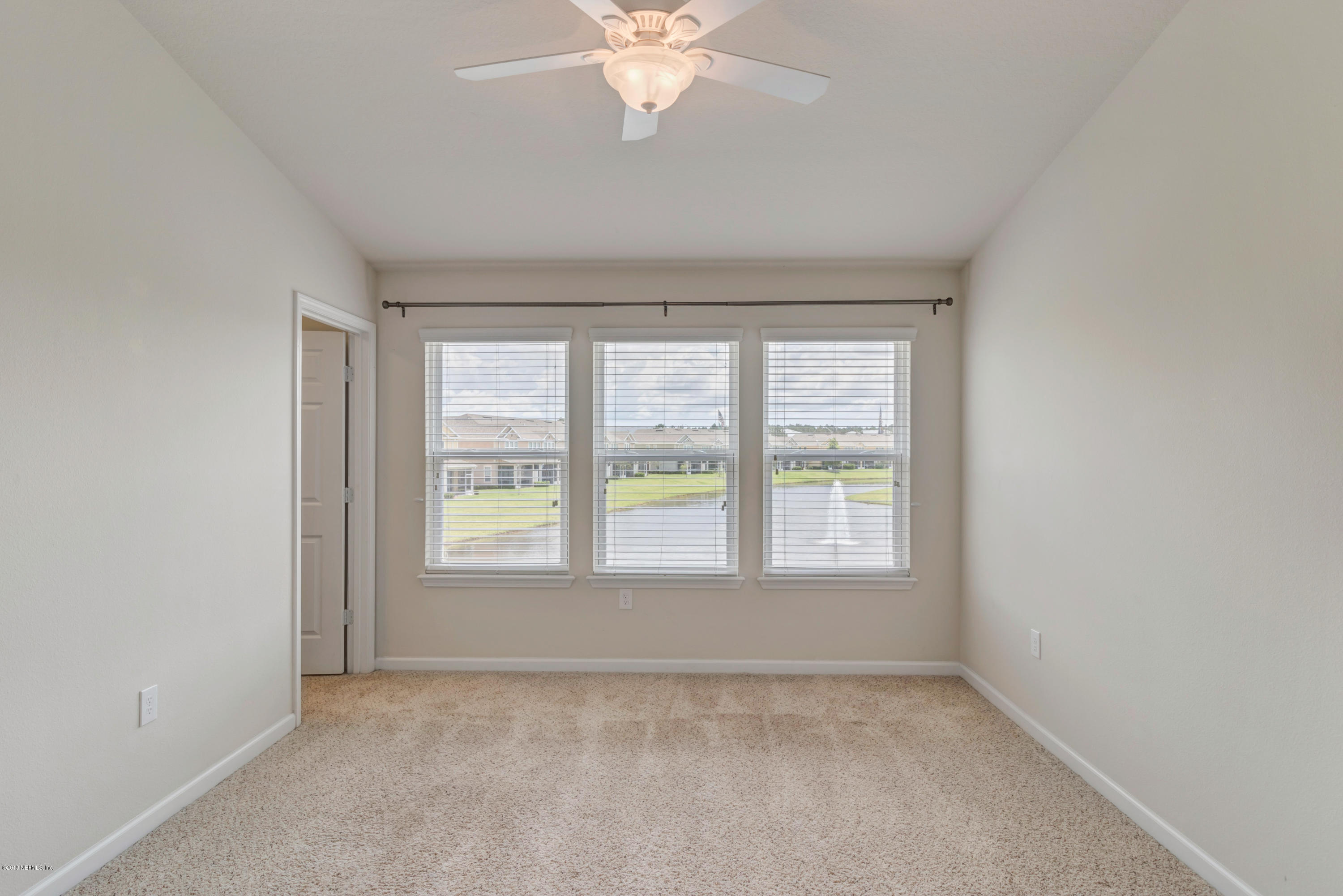 6798 Roundleaf Drive Jacksonville, FL 32258 - Photo 13 of 21 an empty room with a window