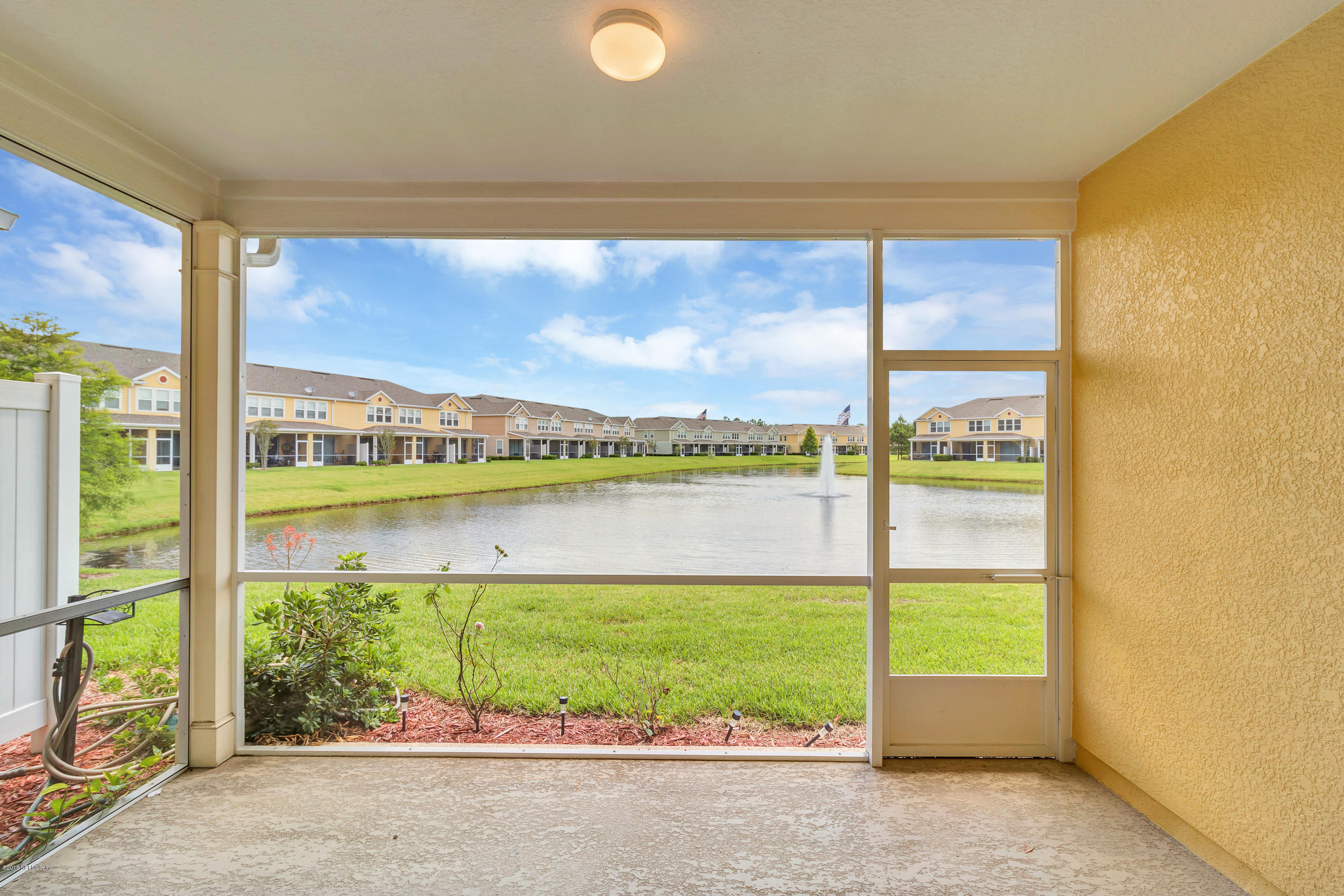 6798 Roundleaf Drive Jacksonville, FL 32258 - Photo 3 of 21 a view of a glass door with a balcony