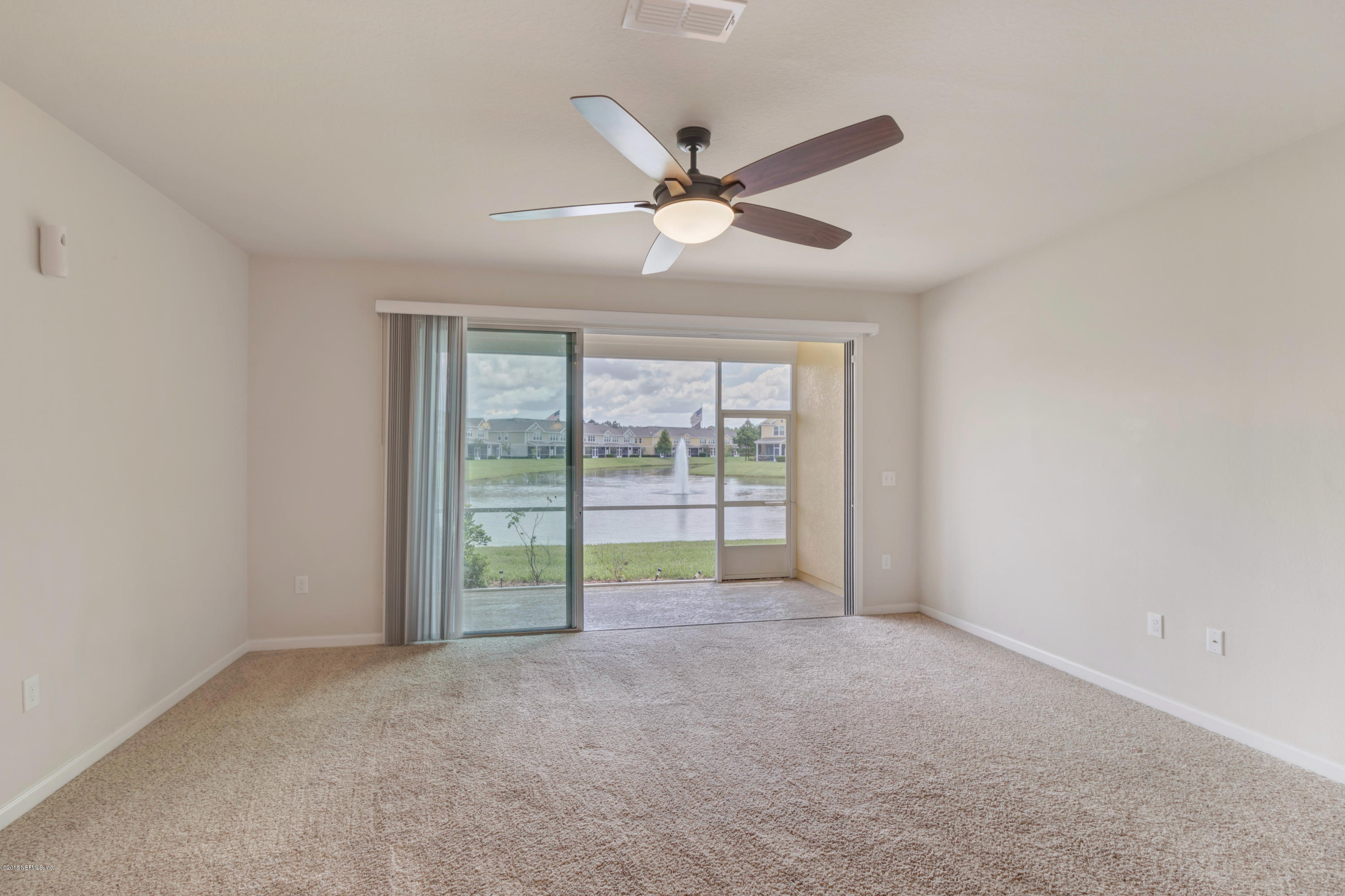 6798 Roundleaf Drive Jacksonville, FL 32258 - Photo 6 of 21 a view of an empty room with a window