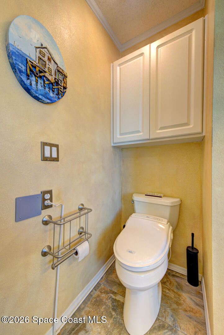 176 Woodsmill Boulevard, Unit 177 Cocoa, FL 32926 - Photo 23 of 63 21 primary bathroom toilet