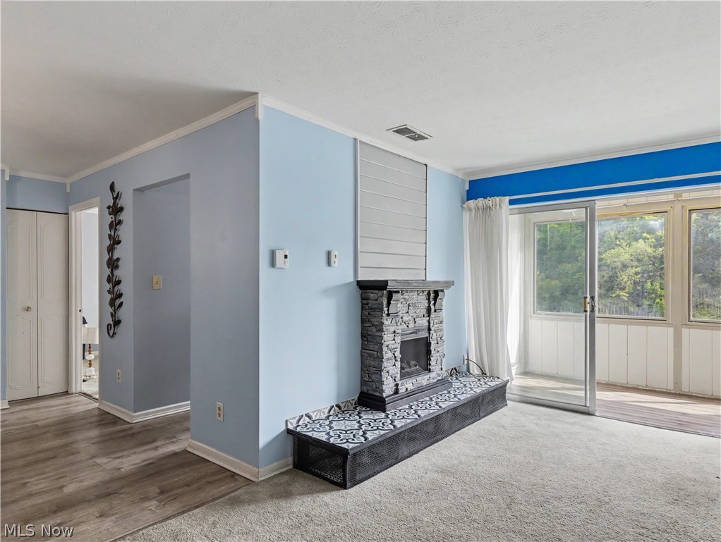 3064 Kent Road Stow, OH 44224 - Photo 10 of 30 Stone-clad fireplace with a tiled hearth