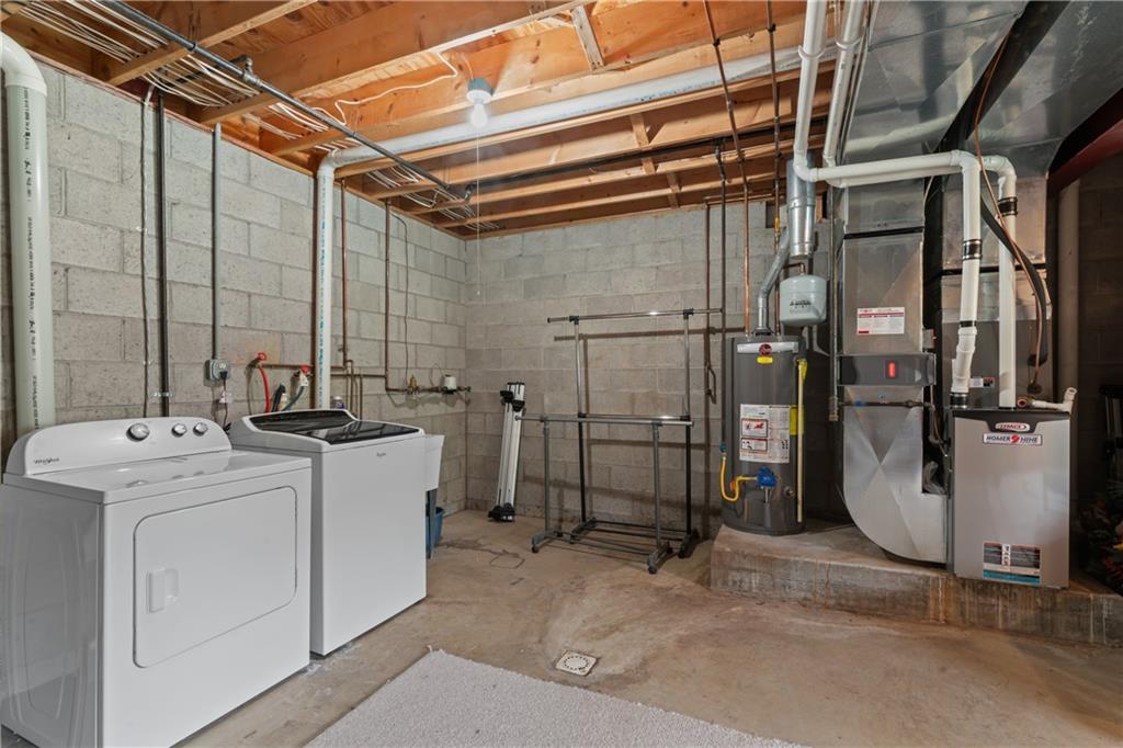 763 Chapel Road Aliquippa, PA 15001 - Photo 17 of 26 Plenty of space for laundry! Newer furnace, A/C and water heater. Furnace has annual Maintenace for winter and Spring by Homer Nine!