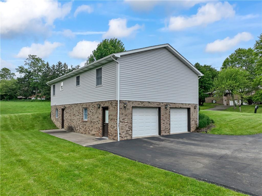 763 Chapel Road Aliquippa, PA 15001 - Photo 22 of 26 Plenty of space for parking plus a large 2 stall garage!