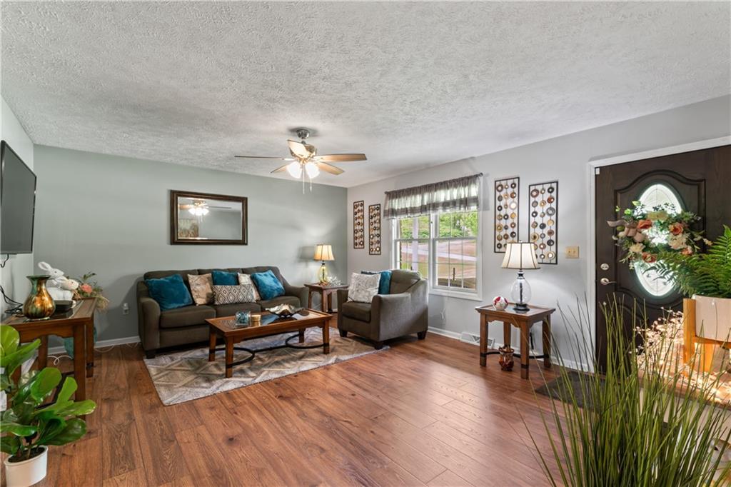 763 Chapel Road Aliquippa, PA 15001 - Photo 5 of 26 Large living-room with plenty of great sunlight and newer flooring.
