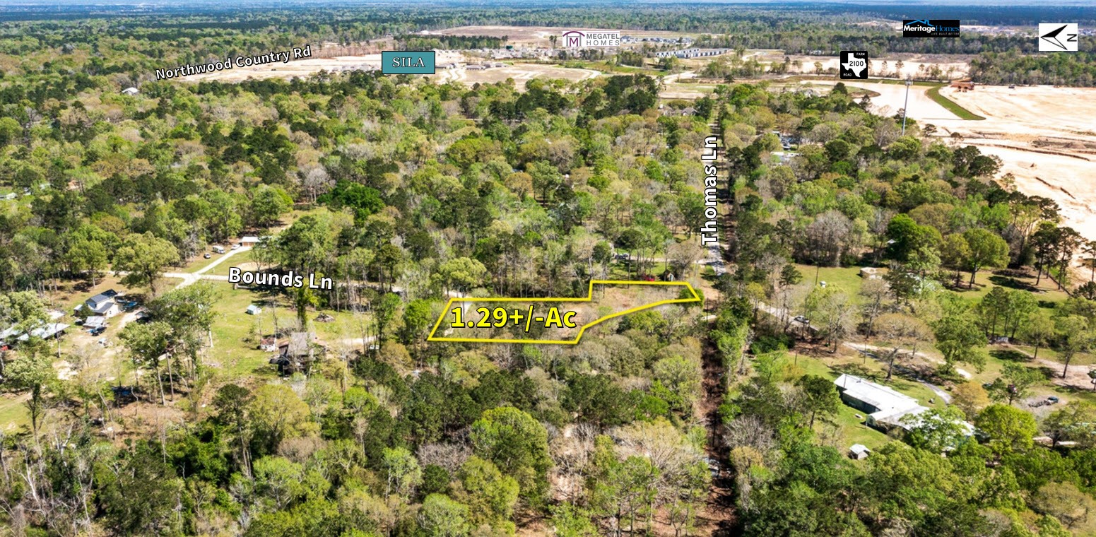 Tbd Thomas Lane Huffman, TX 77336 - Photo 12 of 14 a view of a houses with a yard
