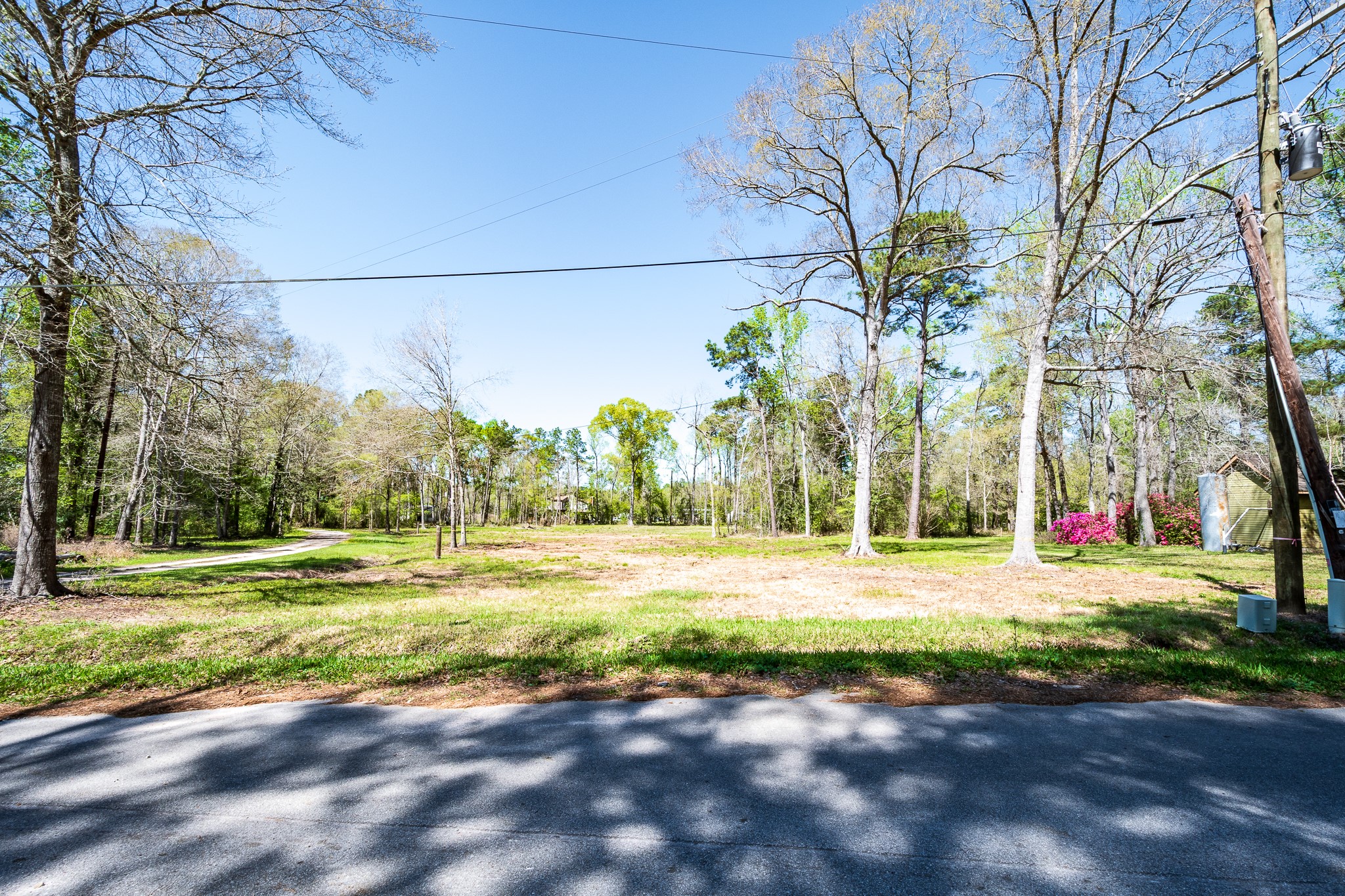 Tbd Thomas Lane Huffman, TX 77336 - Photo 9 of 14 a view of a yard with an outdoor space