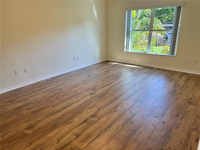a view of a house with a tree