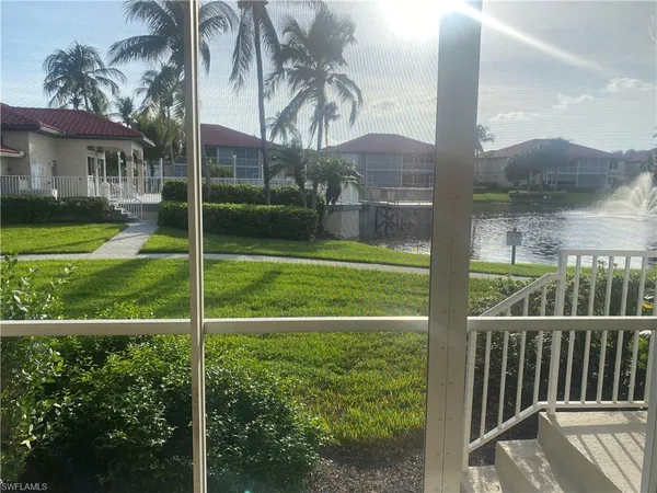 a view of a porch with a yard